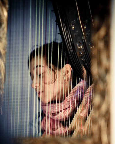 woman playing harp