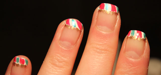 My review of a how-to video and my first attempt at candy cane Christmas nail art.