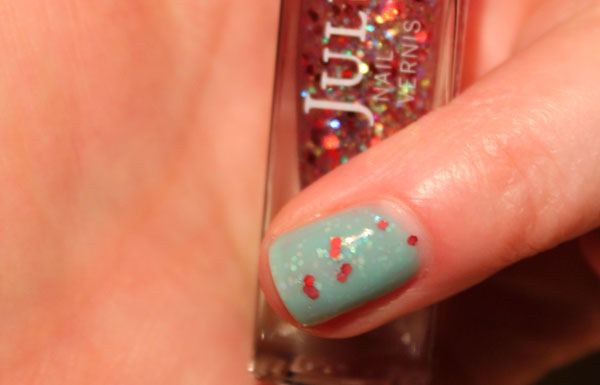 My nails with Julep's Oh Canada glitter sandwiched between the jaded nail polish.